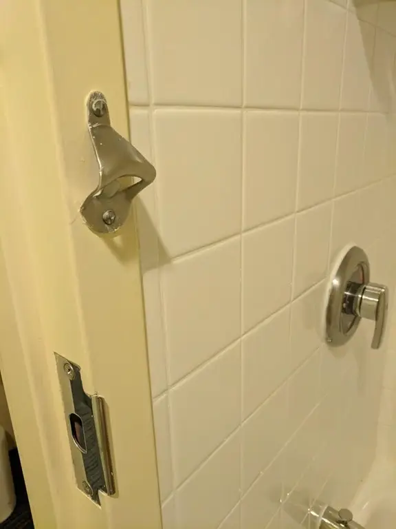 Bottle opener in hotel bathroom