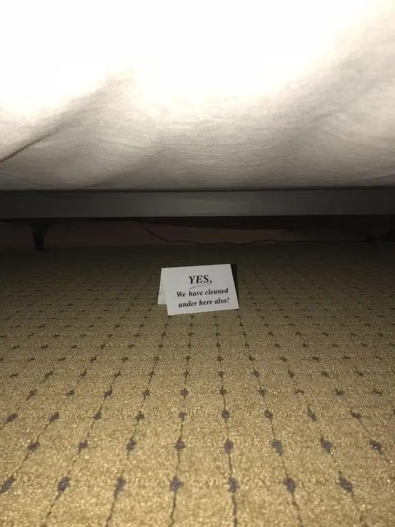 Note under hotel bed